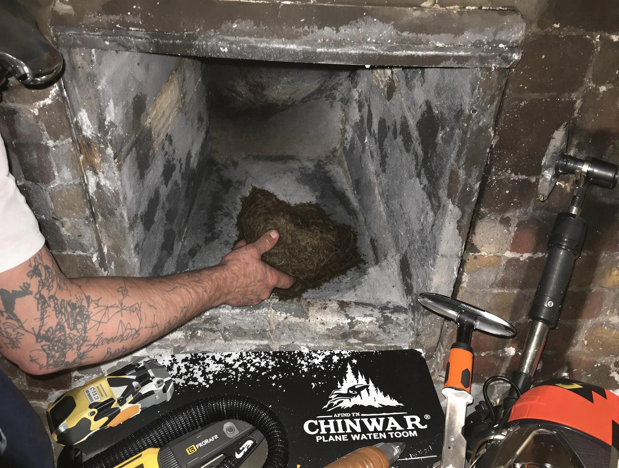 Tuscaloosa Chimney Sweep safely removing debris and screening chimney in Tuscaloosa, AL